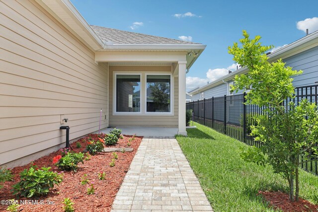 48 Gilchrist Way, Saint Johns, FL 32092 - property entrance with a patio area and a shingled roof