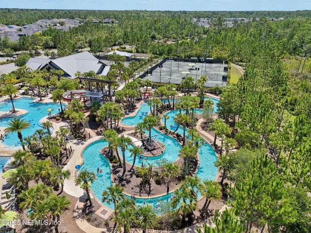 48 Gilchrist Way, Saint Johns, FL 32092 - drone / aerial view of a pool area and a heavily wooded area