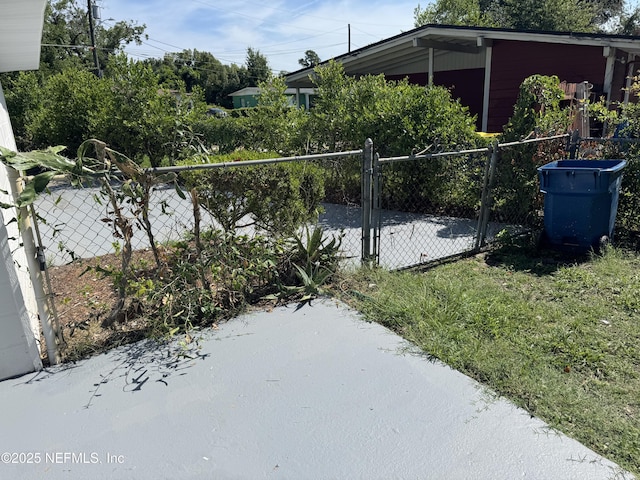 7942 Helston Dr, Jacksonville, FL 32208 - view of yard with a gate