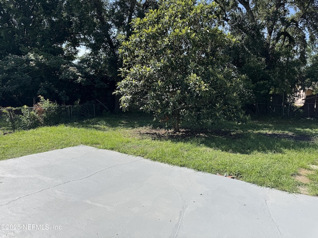7942 Helston Dr, Jacksonville, FL 32208 - view of yard featuring a patio area