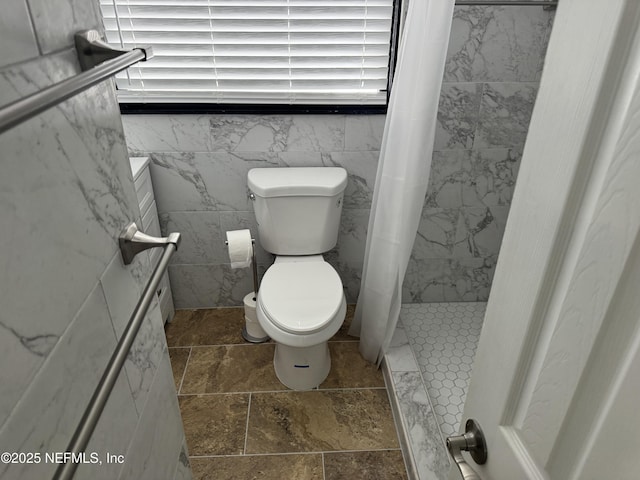 7942 Helston Dr, Jacksonville, FL 32208 - full bathroom featuring a shower stall and stone finish flooring