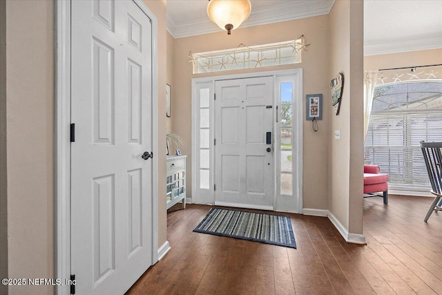 121 Bouganvilla Dr, Ponte Vedra Beach, FL 32082 - entryway with dark wood-style floors, ornamental molding, and healthy amount of natural light