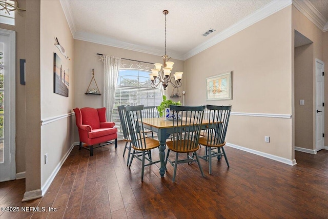 121 Bouganvilla Dr, Ponte Vedra Beach, FL 32082 - dining area featuring hardwood / wood-style floors, crown molding, and a chandelier