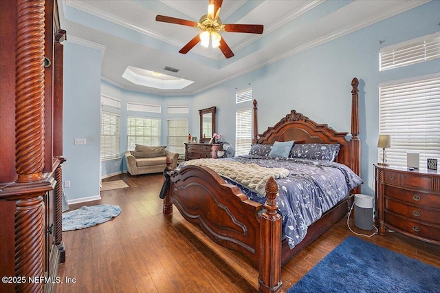 121 Bouganvilla Dr, Ponte Vedra Beach, FL 32082 - bedroom with a tray ceiling, crown molding, hardwood / wood-style flooring, a skylight, and a ceiling fan