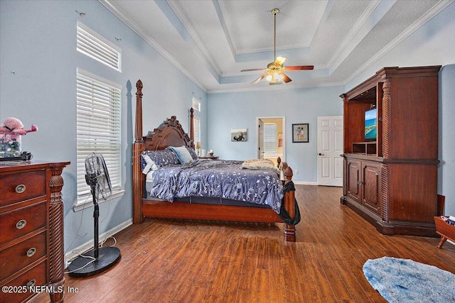 121 Bouganvilla Dr, Ponte Vedra Beach, FL 32082 - bedroom featuring a tray ceiling, dark wood-style floors, ornamental molding, and a ceiling fan