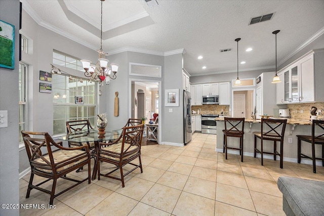 121 Bouganvilla Dr, Ponte Vedra Beach, FL 32082 - dining area featuring a chandelier, ornamental molding, light tile patterned flooring, and recessed lighting