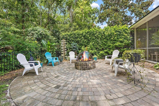 121 Bouganvilla Dr, Ponte Vedra Beach, FL 32082 - view of patio featuring a fire pit and a sunroom