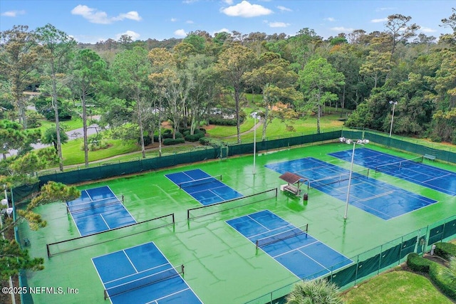 121 Bouganvilla Dr, Ponte Vedra Beach, FL 32082 - view of tennis court with a forest view