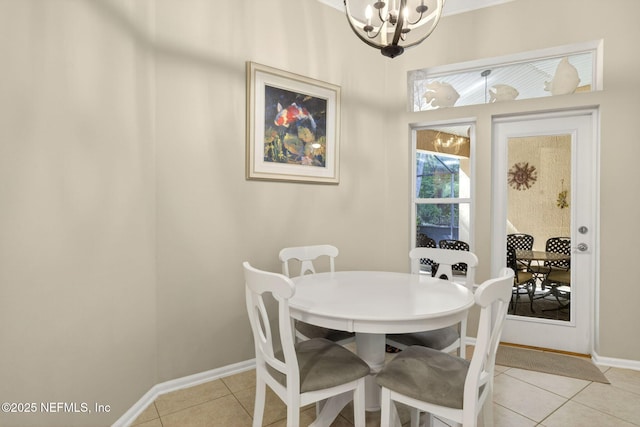 8523 Hampton Landing Dr, Jacksonville, FL 32256 - dining room with light tile patterned floors and a chandelier