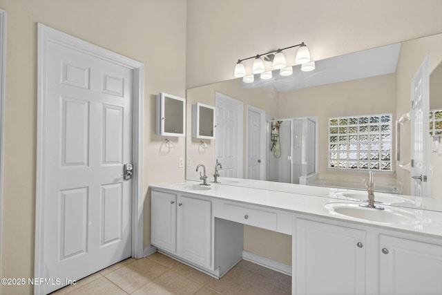 8523 Hampton Landing Dr, Jacksonville, FL 32256 - bathroom featuring a shower stall, double vanity, tile patterned floors, and a garden tub