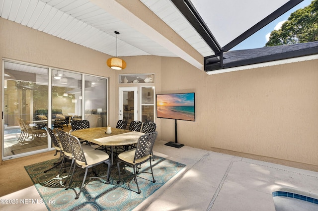 8523 Hampton Landing Dr, Jacksonville, FL 32256 - dining space featuring concrete floors, beamed ceiling, and a textured wall