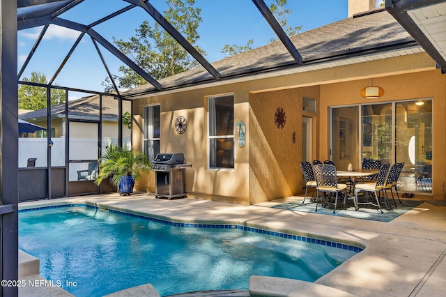 8523 Hampton Landing Dr, Jacksonville, FL 32256 - swimming pool featuring area for grilling, a patio, glass enclosure, and outdoor dining space
