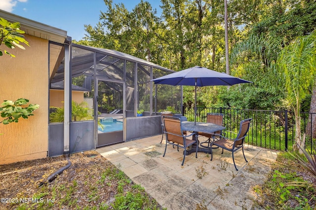 8523 Hampton Landing Dr, Jacksonville, FL 32256 - view of patio / terrace with an outdoor pool, glass enclosure, and outdoor dining space