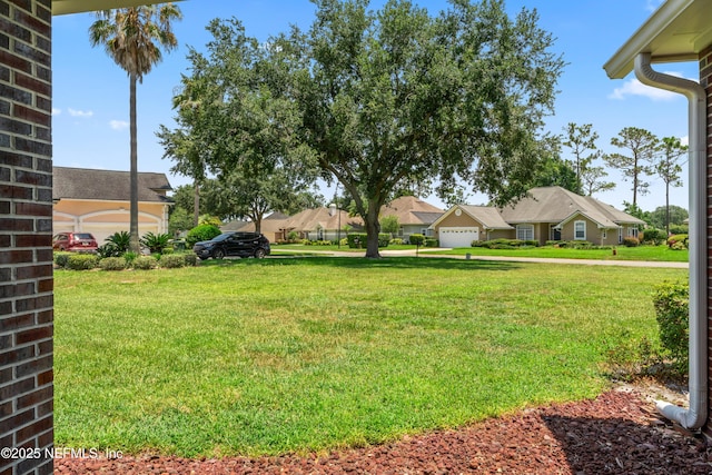 13707 Alesbury Ct, Jacksonville, FL 32224 - view of green lawn featuring a residential view