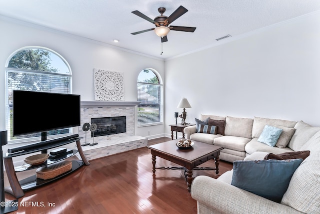 13707 Alesbury Ct, Jacksonville, FL 32224 - living area with a ceiling fan, wood finished floors, ornamental molding, and a fireplace