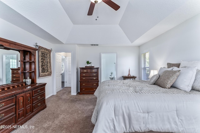 13707 Alesbury Ct, Jacksonville, FL 32224 - bedroom featuring light colored carpet, a raised ceiling, a spacious closet, and a ceiling fan