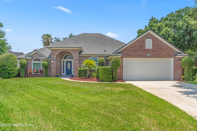 13707 Alesbury Ct, Jacksonville, FL 32224 - view of front facade with driveway, a garage, a front yard, brick siding, and roof with shingles
