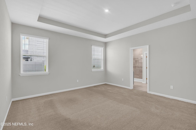 575 Buttonwood Loop, Yulee, FL 32097 - carpeted spare room with a raised ceiling, recessed lighting, and a smoke detector