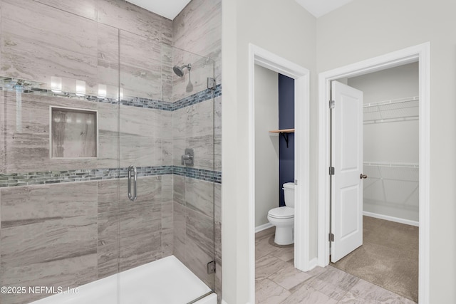 575 Buttonwood Loop, Yulee, FL 32097 - full bath with a shower stall, a walk in closet, and marble finish flooring