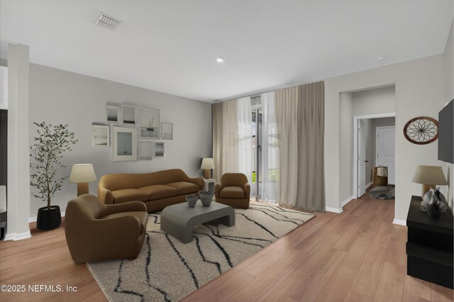 575 Buttonwood Loop, Yulee, FL 32097 - living area featuring light wood-style floors and baseboards