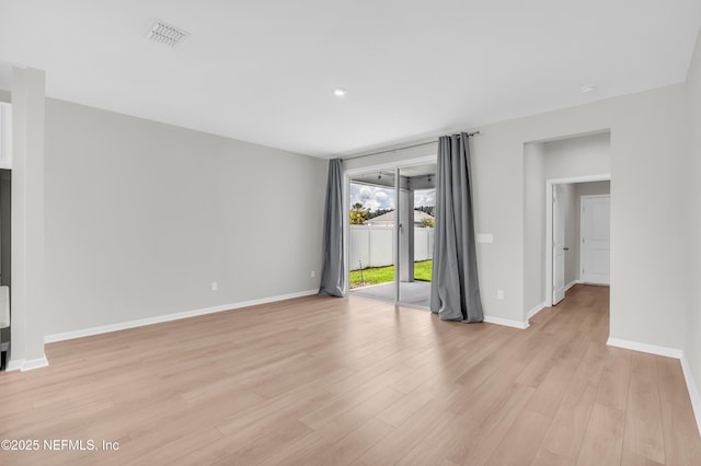 575 Buttonwood Loop, Yulee, FL 32097 - spare room featuring light wood-style floors and baseboards