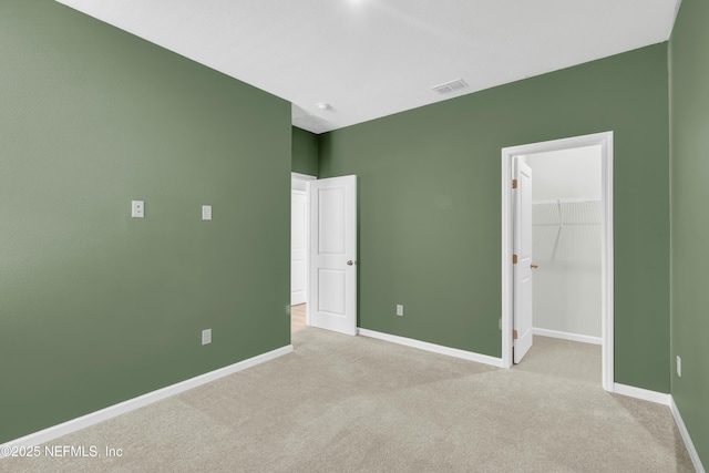575 Buttonwood Loop, Yulee, FL 32097 - unfurnished bedroom with carpet flooring and a spacious closet