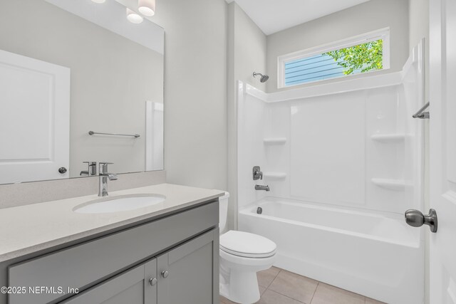 575 Buttonwood Loop, Yulee, FL 32097 - bathroom with vanity, tile patterned floors, and shower / tub combination