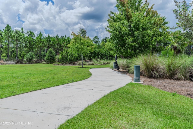 575 Buttonwood Loop, Yulee, FL 32097 - view of property's community with a yard