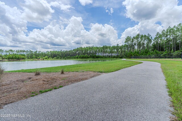 575 Buttonwood Loop, Yulee, FL 32097 - water view with a heavily wooded area