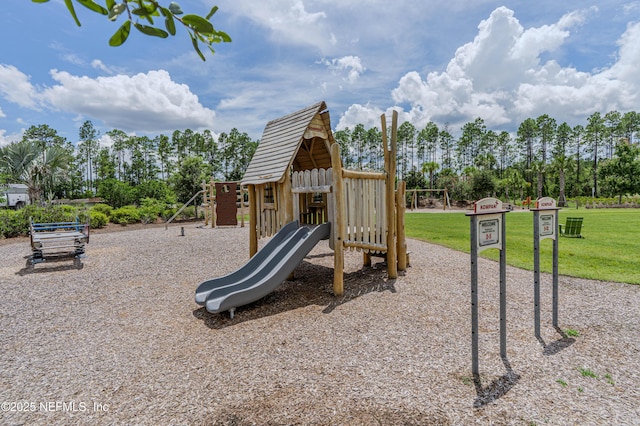 575 Buttonwood Loop, Yulee, FL 32097 - community jungle gym featuring a yard