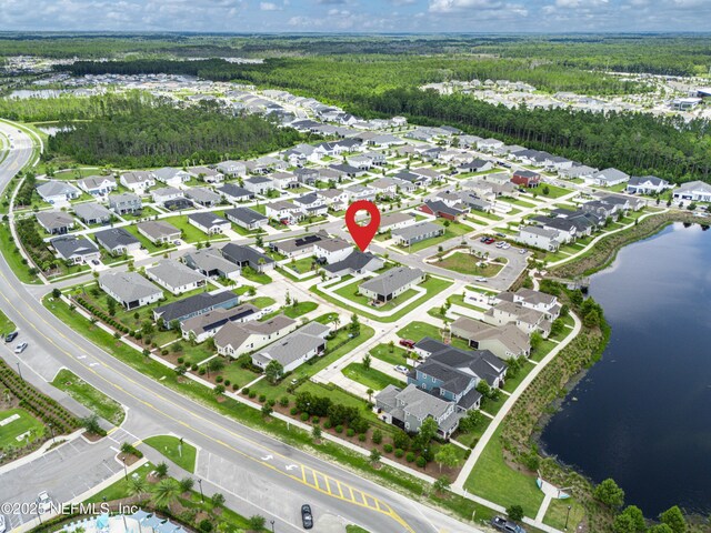 575 Buttonwood Loop, Yulee, FL 32097 - aerial overview of property's location featuring a large body of water and nearby suburban area