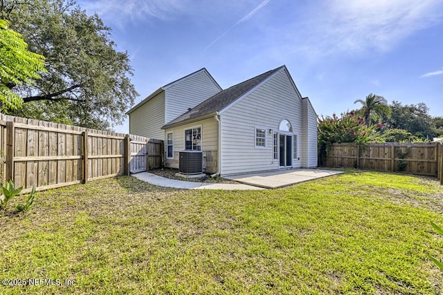 7728 Lynchburg Ct W, Jacksonville, FL 32277 - back of house featuring a patio, a fenced backyard, and roof with shingles