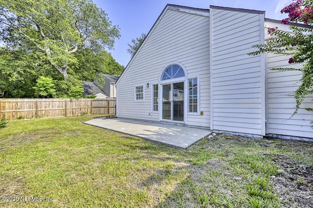 7728 Lynchburg Ct W, Jacksonville, FL 32277 - rear view of house with a patio