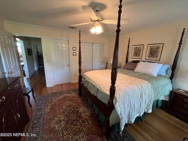 9570 Preston Trl W, Ponte Vedra Beach, FL 32082 - bedroom featuring wood finished floors, a closet, ceiling fan, and ornamental molding