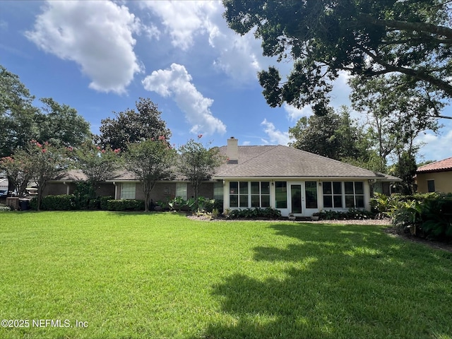 9570 Preston Trl W, Ponte Vedra Beach, FL 32082 - rear view of house featuring a yard and a chimney