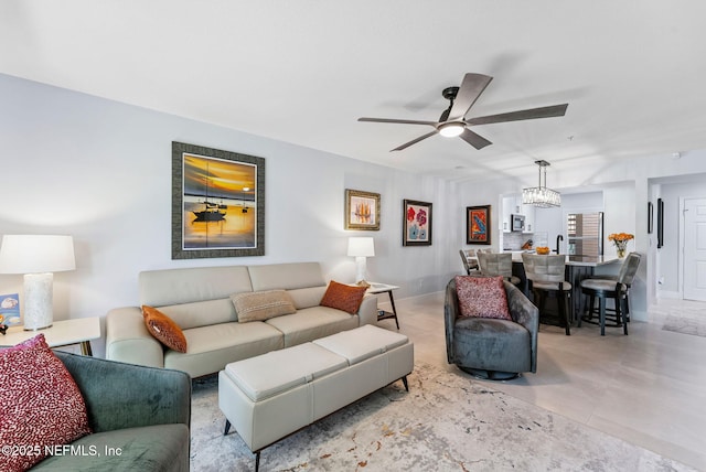 212 16th St Unit A, Saint Augustine Beach, FL 32080 - living room featuring a ceiling fan and baseboards