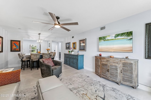 212 16th St Unit A, Saint Augustine Beach, FL 32080 - living room with ceiling fan and a chandelier
