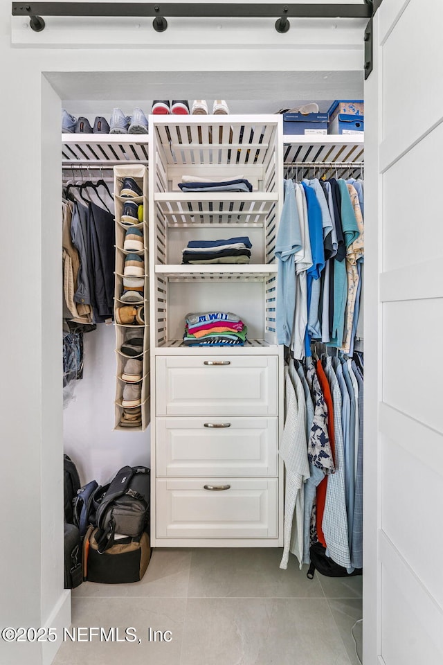 212 16th St Unit A, Saint Augustine Beach, FL 32080 - spacious closet with light tile patterned flooring