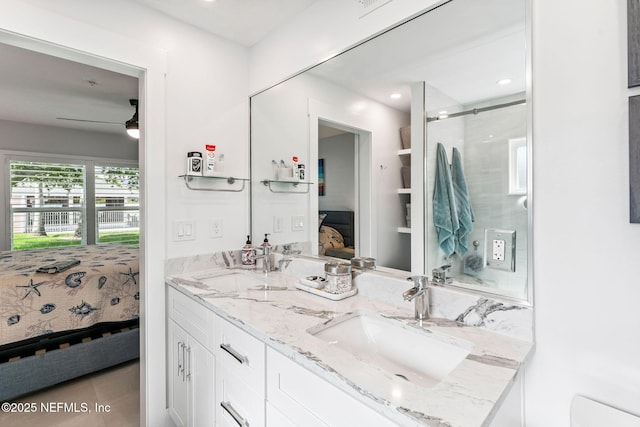 212 16th St Unit A, Saint Augustine Beach, FL 32080 - ensuite bathroom with double vanity, ceiling fan, a shower stall, recessed lighting, and tile patterned flooring