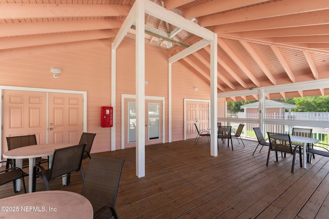 212 16th St Unit A, Saint Augustine Beach, FL 32080 - wooden terrace with outdoor dining space and french doors