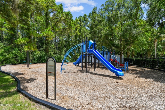 12569 Kernan Forest Blvd, Jacksonville, FL 32225 - communal playground with view of wooded area