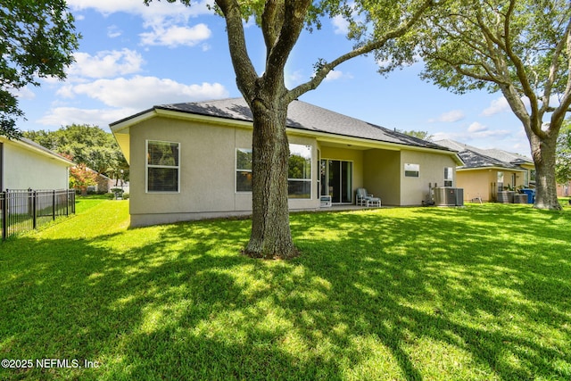 12569 Kernan Forest Blvd, Jacksonville, FL 32225 - rear view of property with stucco siding