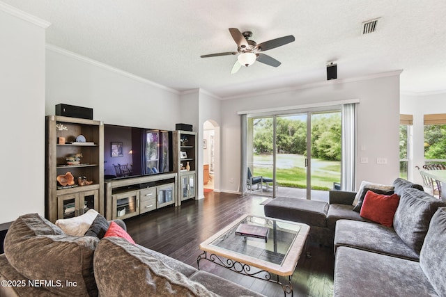 12569 Kernan Forest Blvd, Jacksonville, FL 32225 - living room with hardwood / wood-style flooring, ceiling fan, ornamental molding, a textured ceiling, and arched walkways