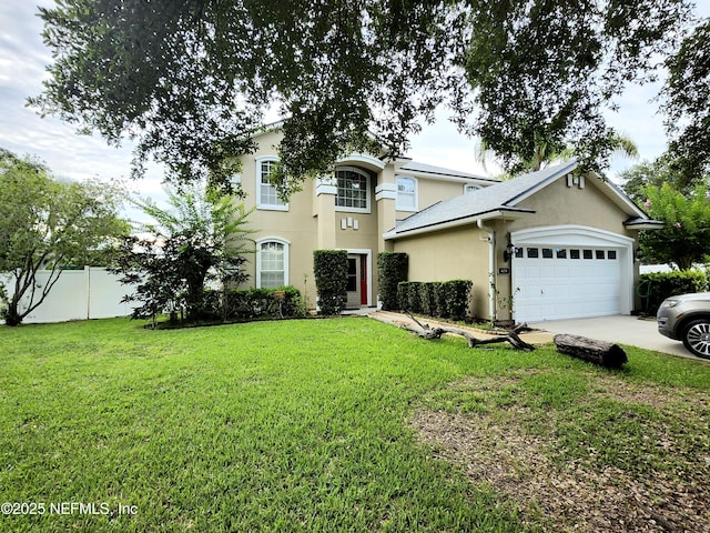 409 Pine Harvest Ct, Saint Augustine, FL 32084 - view of front of property featuring stucco siding, an attached garage, and concrete driveway