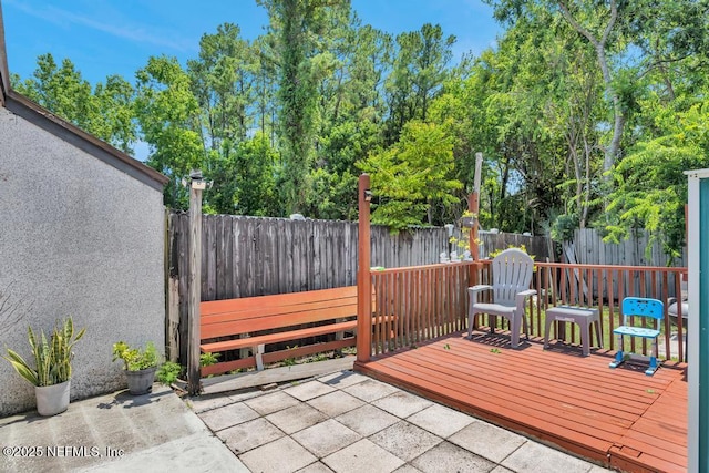 2120 Derringer Cir W, Jacksonville, FL 32225 - wooden terrace with a fenced backyard and a patio