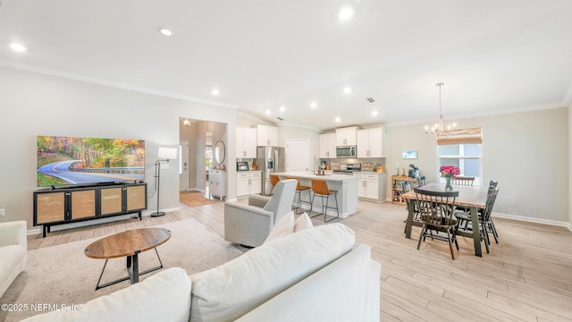 84 Granite City Ave, Saint Johns, FL 32259 - living room featuring crown molding, a chandelier, recessed lighting, and light wood finished floors