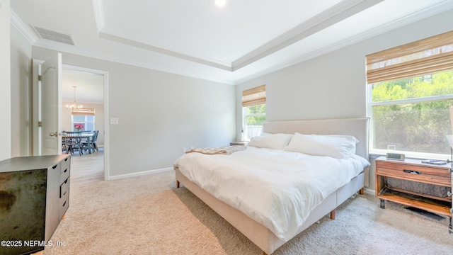 84 Granite City Ave, Saint Johns, FL 32259 - bedroom with a raised ceiling, crown molding, a chandelier, and light colored carpet