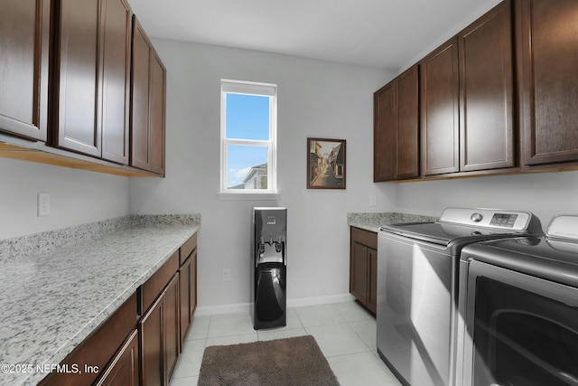 50 Skyline Ln, Saint Augustine, FL 32092 - washroom with washing machine and dryer, cabinet space, and light tile patterned floors