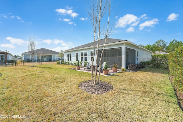 50 Skyline Ln, Saint Augustine, FL 32092 - rear view of house featuring a patio, a fenced backyard, and a sunroom