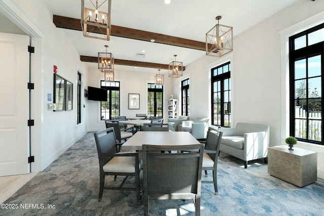 50 Skyline Ln, Saint Augustine, FL 32092 - dining area with beam ceiling, recessed lighting, a chandelier, and french doors
